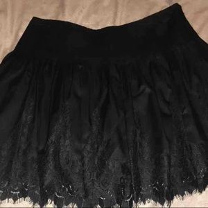 Bebe Pleated Lace Skirt